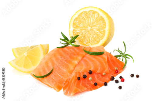 Red fish. Raw salmon fillet with rosemary isolate on white background