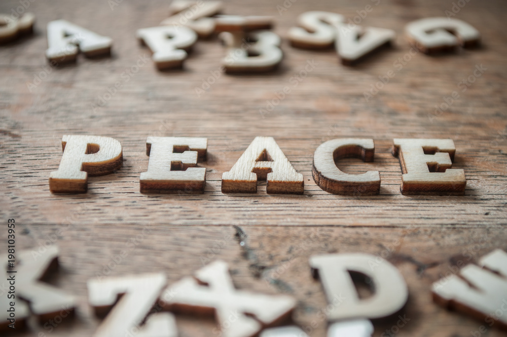 concept wooden letters on wooden table background - Peace concept wooden letters on wooden table background - Peace