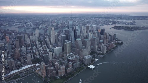 New York City wide angle aerial view of of Lower Manhattan Financial District skyskrapers and Brooklyn from the Hudson River.
