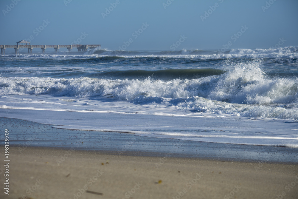 East coast beach and pier during Northeastern storm East coast beach and pier during Northeastern storm