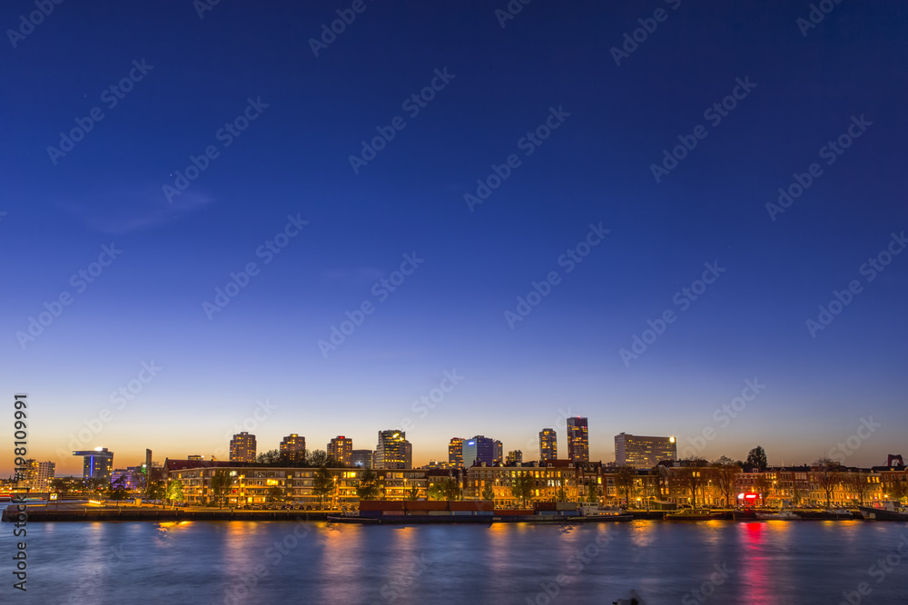 Travel Concepts and Ideas. Beautiful and Astonishing View of Rotterdam Skyline at Blue Hour Time.