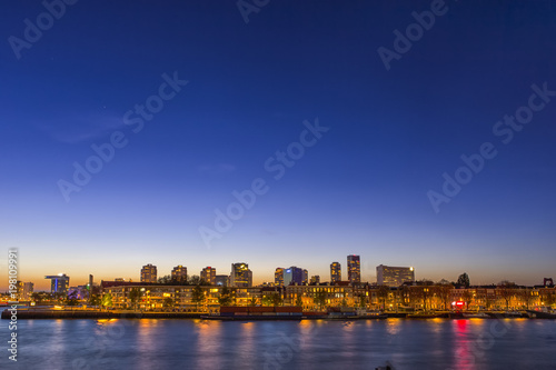 Travel Concepts and Ideas. Beautiful and Astonishing View of Rotterdam Skyline at Blue Hour Time.