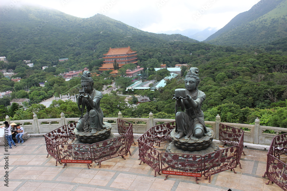 emale disciple statue offering a gift to the Big Buddha at Po Lin monastery, Lantau.JPG