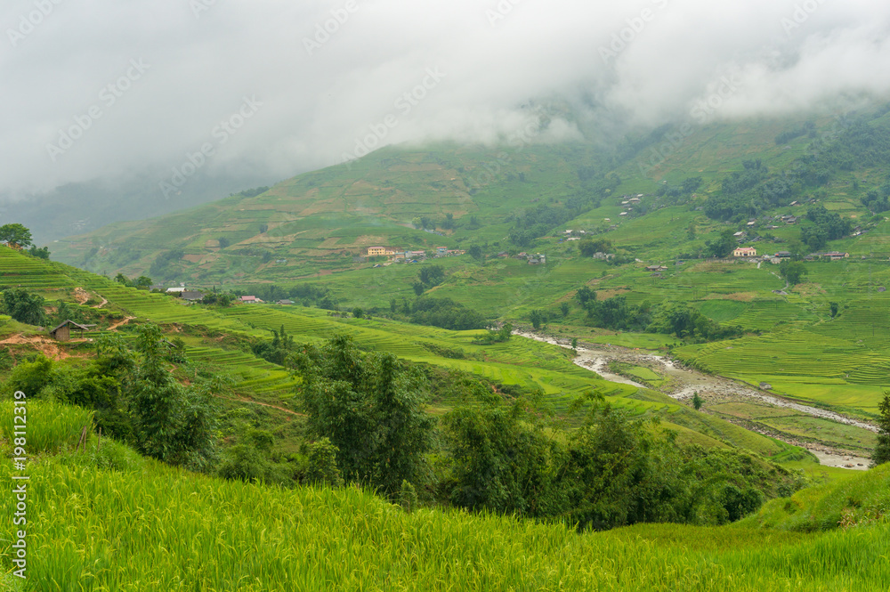 Mountain valley with slopes covered with rice terraces