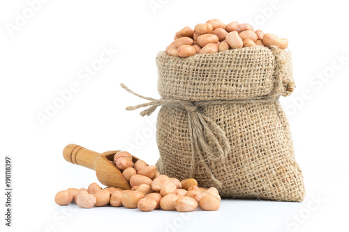 peanuts in burlap sack isolated on white
