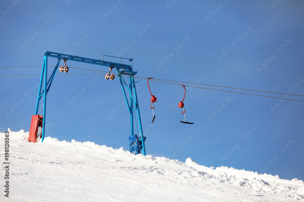 Ski lift at snowy resort. Winter vacation Ski lift at snowy resort. Winter vacation