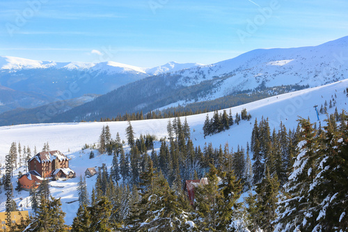 Fototapeta Naklejka Na Ścianę i Meble -  Snowy resort in mountains on winter day
