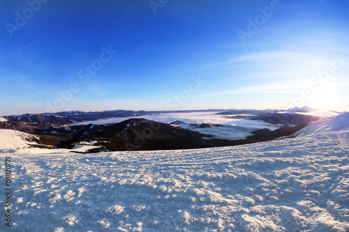 Beautiful landscape with snowy mountains in winter morning