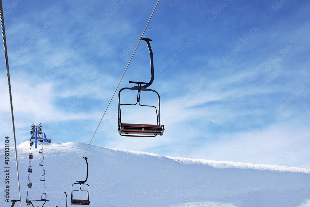 Ski lift at snowy resort. Winter vacation Ski lift at snowy resort. Winter vacation