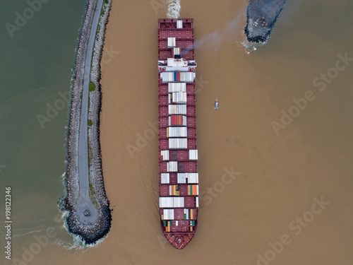 Container Ship Between Breakwaters