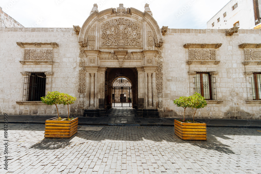 Fototapeta premium Pedestrian path in a cobbled street corner of Arequipa (Peru)