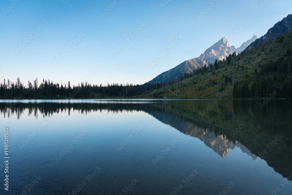 Peaceful reflection on lake