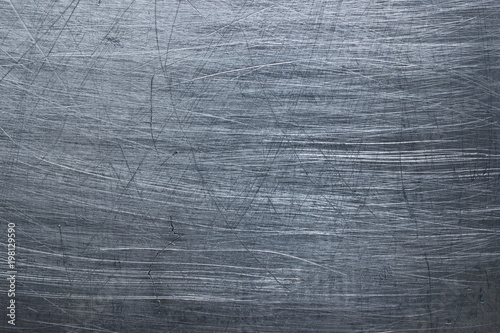 Dark metallic background, steel texture blackened patina