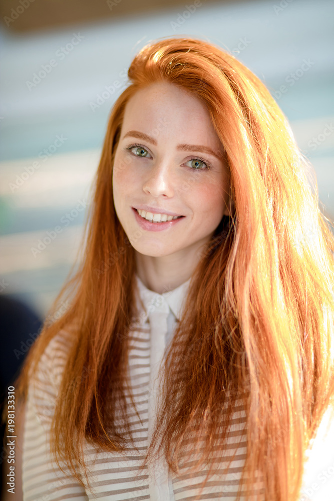portrait of good-looking ginger female with long straight shiny hair and  natural make-up smiling. happy mood. sunny girl. dyed hair. natural red hair  Stock Photo | Adobe Stock