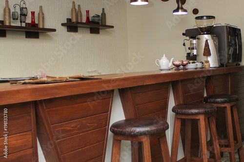 cafe interior design with bar and wooden chairs