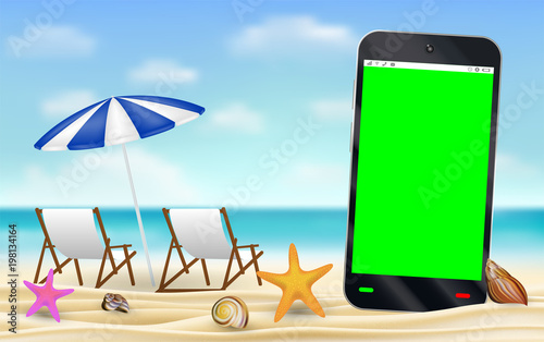 Fototapeta Naklejka Na Ścianę i Meble -  smartphone green screen on sea sand beach