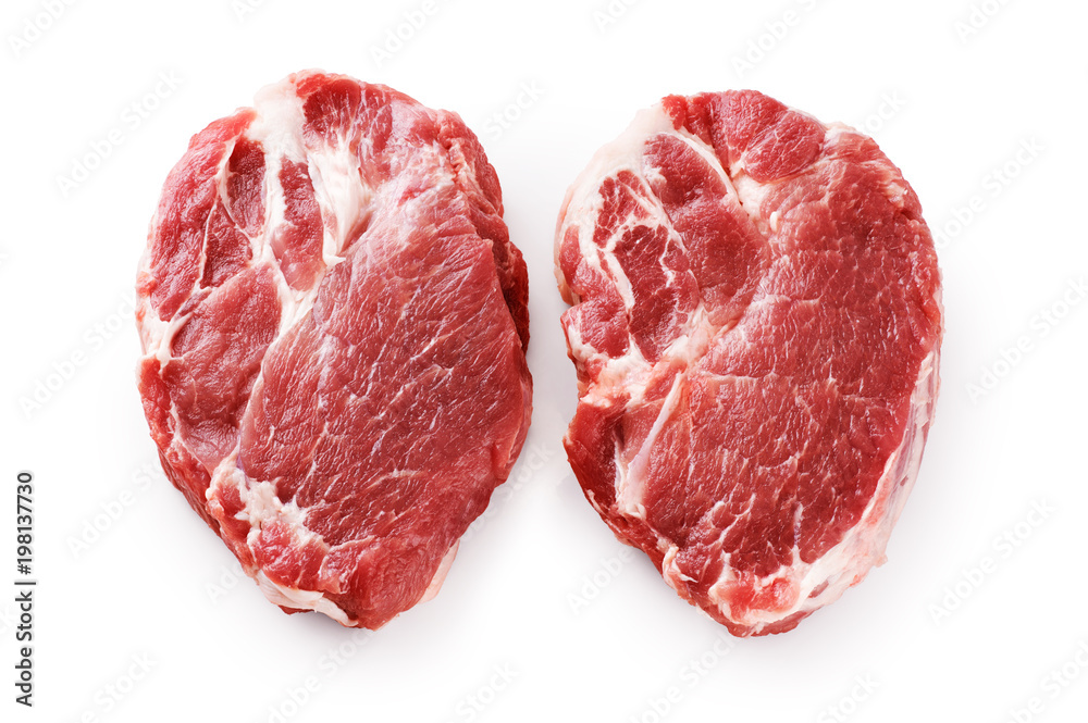 Fresh raw pork steaks isolated on white background. Fresh raw pork steaks isolated on white background.