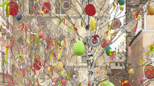 A colorful Easter tree in Prague with big eggs and colorful ribbons. photo