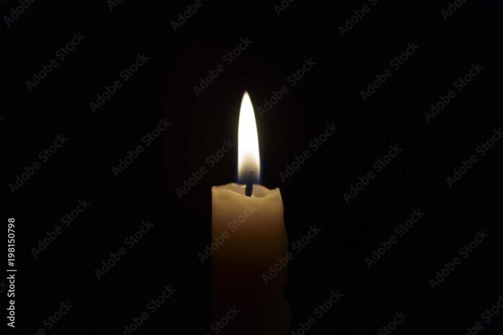 Candle flame closeup isolated on black. Abstract Background. Candle flame closeup isolated on black. Abstract Background.