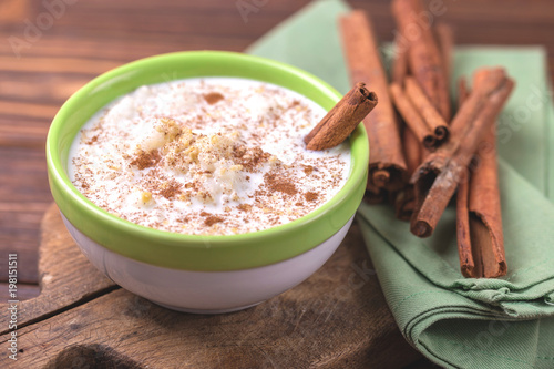 Brazilian winter festival dessert Canjica. White corn porridge photo