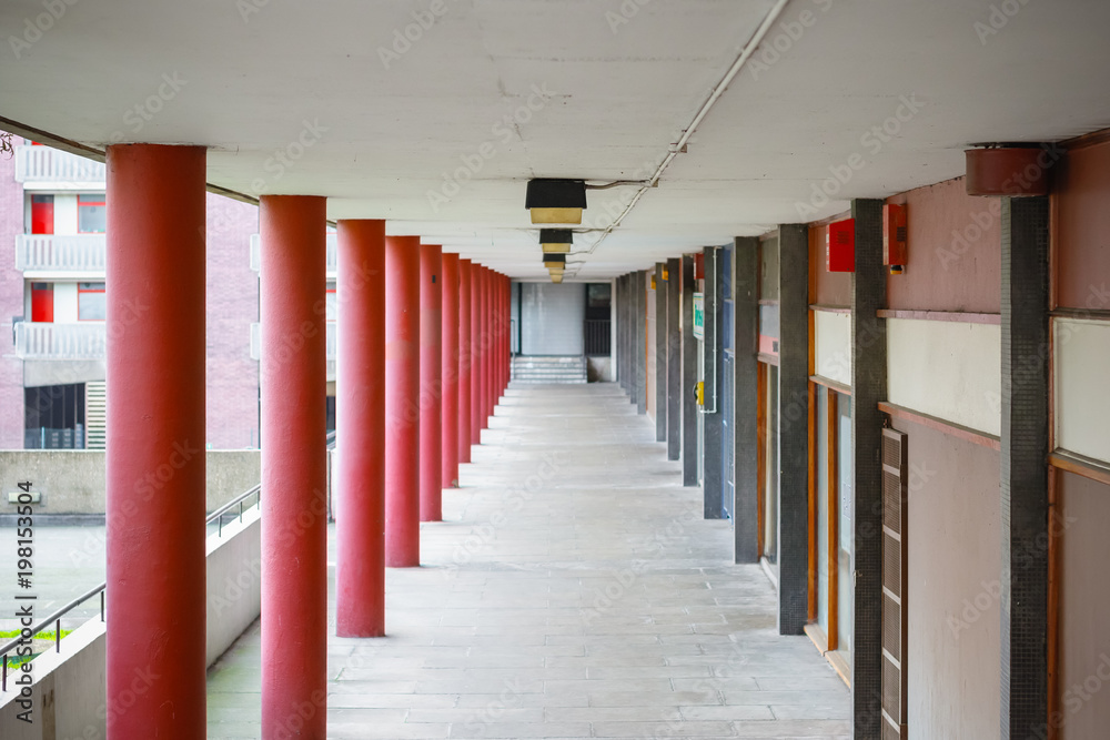 Outdoor communal corridor at a council housing block in London Photos |  Adobe Stock