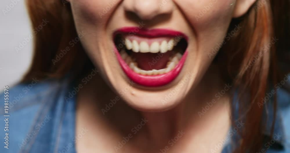 Facial Expressions Of Young Redhead Woman On Brick Wall Facial Expressions Of Young Redhead Woman On Brick Wall