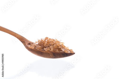 Brown rock sugar isolated on white