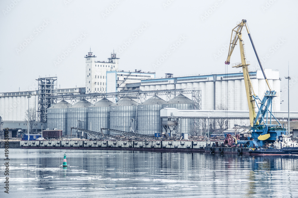 Port grain elevator. The Don river and the port. Industrial zone. Russia, Rostov-on-Don.