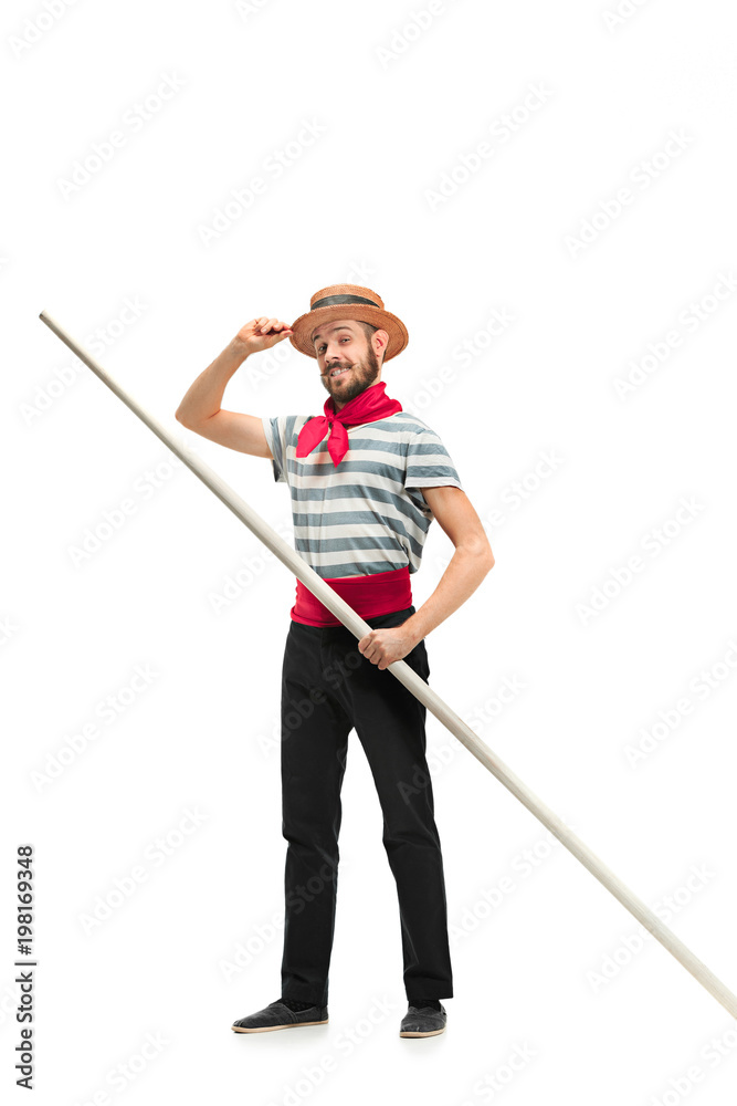 Caucasian man in traditional gondolier costume and hat Caucasian man in traditional gondolier costume and hat