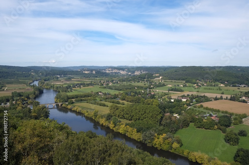 Late summer view over patchwork fields and river of the Dordogne valley from Domme  Aquitane  France