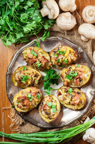 Baked potatoes stuffed with bacon, mushrooms and cheese
