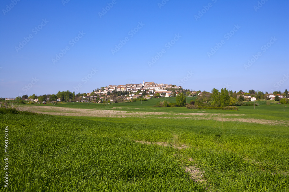 View of picturesque Monflanquin, Lot-et-Garonne, France. The hilltop bastide town belongs to View of picturesque Monflanquin, Lot-et-Garonne, France. The hilltop bastide town belongs to