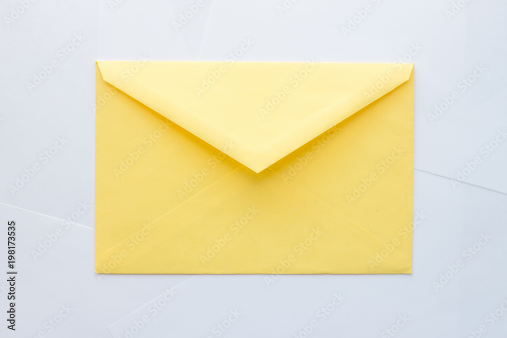 Yellow envelope on white background Yellow envelope on white background