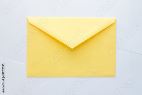 Yellow envelope on white background