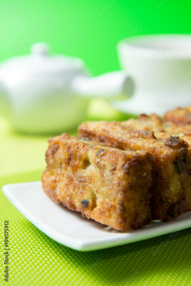 Deep fried Chinese style pumpkin cake ready to serve Deep fried Chinese style pumpkin cake ready to serve