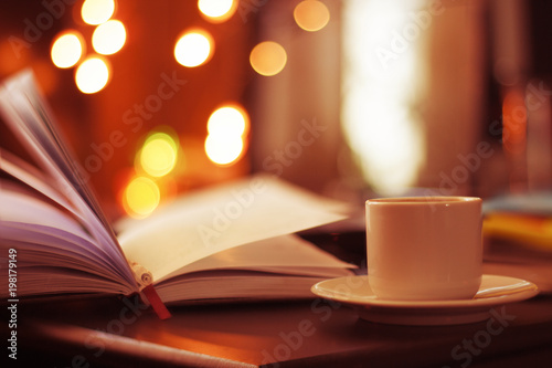 magical cozy atmosphere with bokk and cup