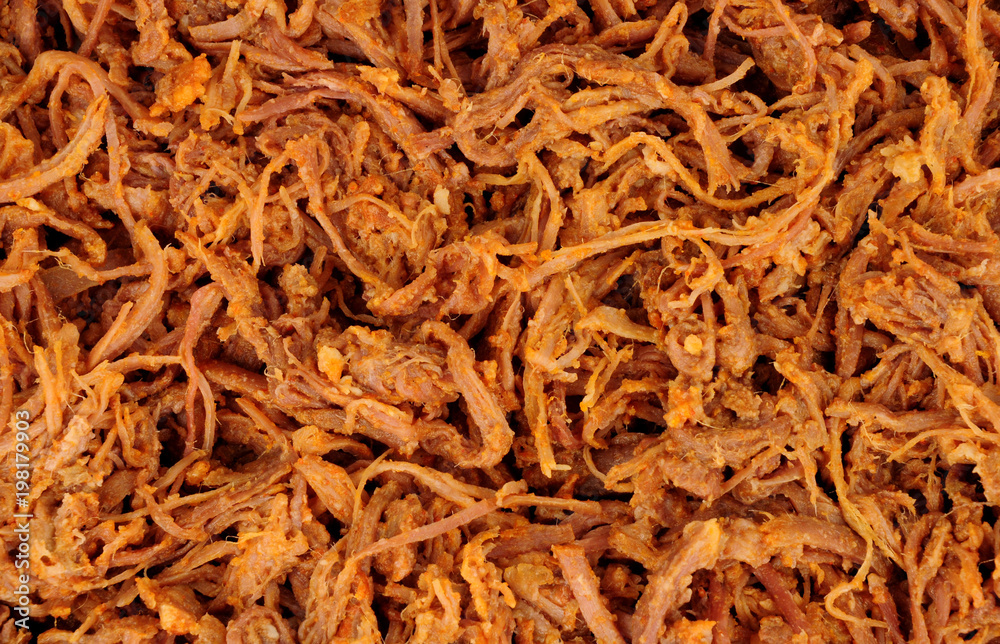 Slow cooked roasted shredded beef background Slow cooked roasted shredded beef background