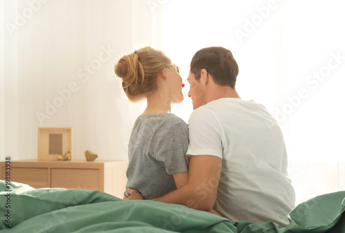 Young lovely couple sitting...