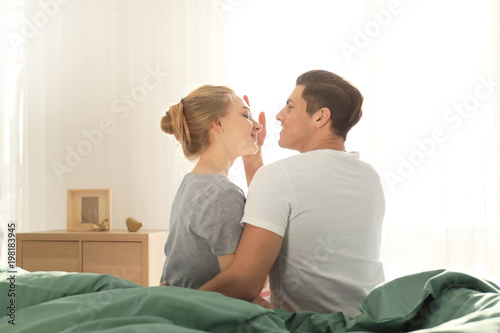 Young lovely couple sitting...