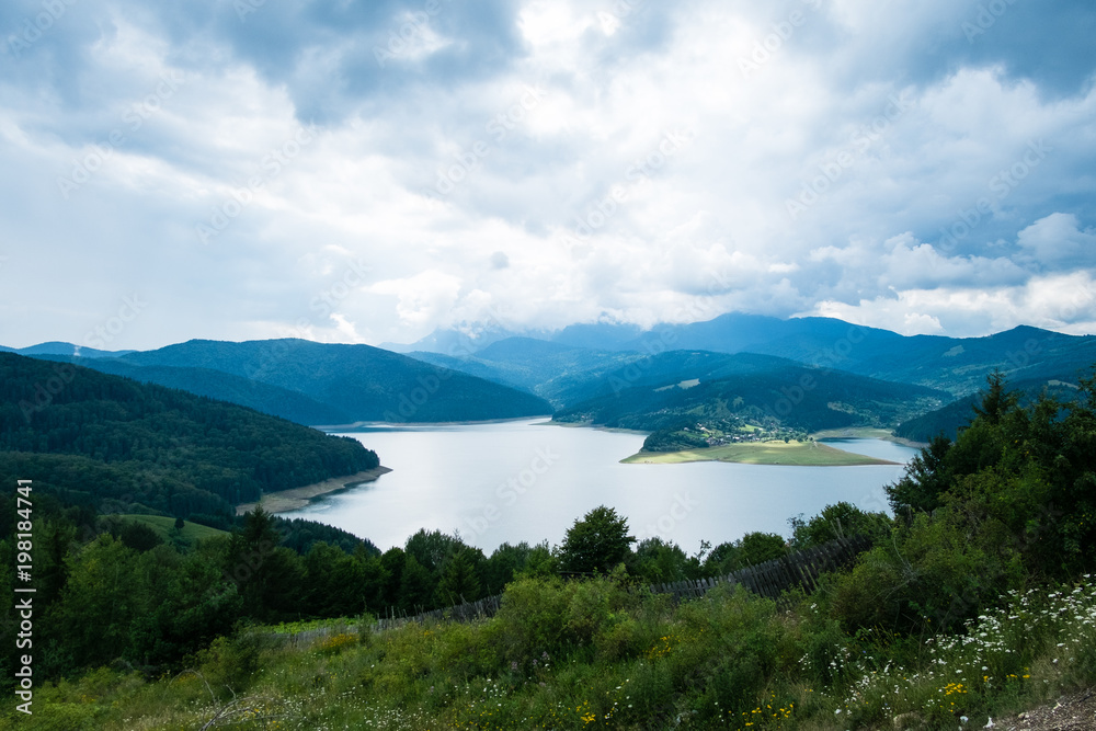 Cloudy landscape view from Lake Bicaz in Romania
