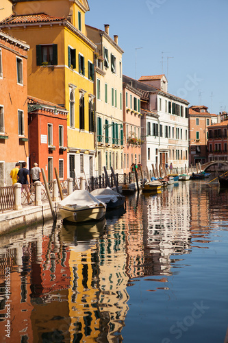 Picturesque spring view of Vennice with famous water canal and colorful houses. Splendid morning scene in Italy, Europe Traveling concept background. photo