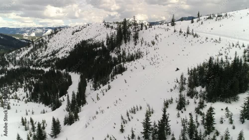 Snowmobile Hill Climb Aerial in Winter Sno Park