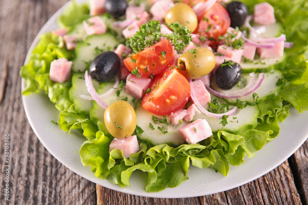 salad with tomato, ham and olive