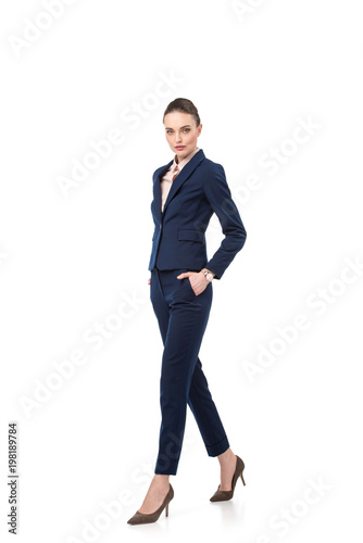 beautiful adult businesswoman in stylish suit isolated on white