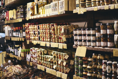 Jars of food in a delicatessen in Italy photo