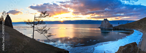 Lake Baikal. Olkhon Island in spring. Panoramic view of the beautiful sunset © Katvic
