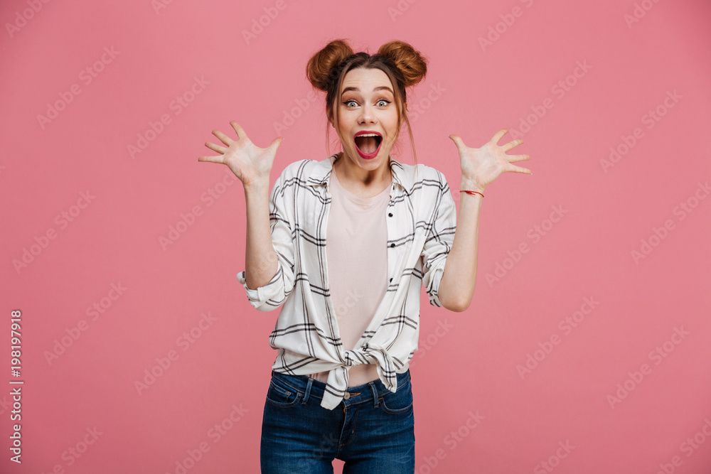 Portrait of an excited young girl looking at camera Portrait of an excited young girl looking at camera