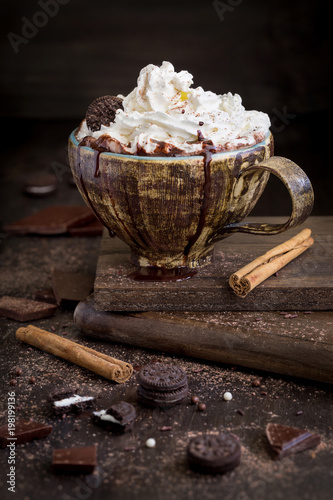 chocolate milkshake with cream and cinnamon photo