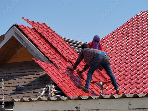 Technician is Work Roof Repair