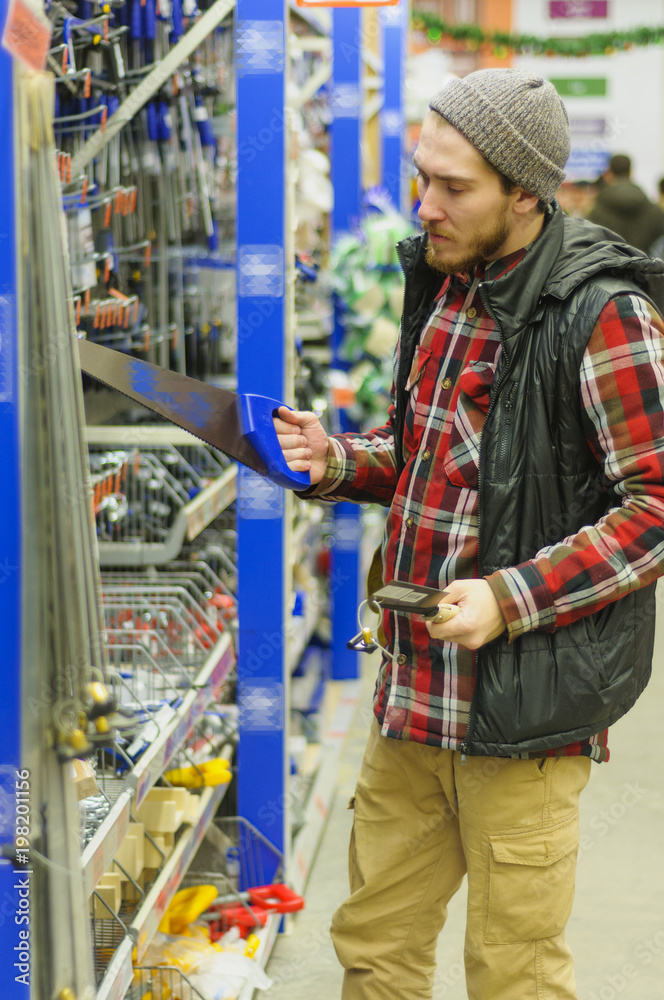 Man in a hardware store Man in a hardware store